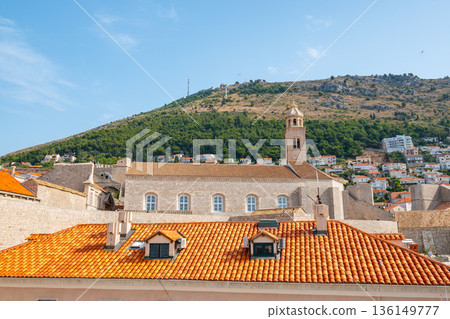 Ancient stone wall of Dubrovnik Old Town, stunning fortification system. The world famous and most visited historic city of Croatia, UNESCO World Heritage site Ancient stone wall of Dubrovnik Old Town, stunning fortification system. The world famous and most visited historic city of Croatia, UNESCO World Heritage site 136149777