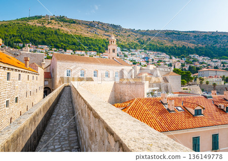 Ancient stone wall of Dubrovnik Old Town, stunning fortification system. The world famous and most visited historic city of Croatia, UNESCO World Heritage site 136149778