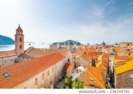 Aerial panoramic view of old city Dubrovnik. Ancient city with big city walls near adriatic sea. View of roofs, sunny summer day. 136149782