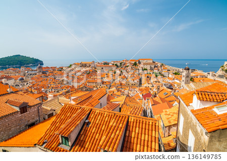 Aerial panoramic view of old city Dubrovnik. Ancient city with big city walls near adriatic sea. View of roofs, sunny summer day. 136149785