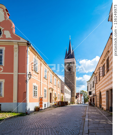 View of Telc - tower of Church of Spirit near the Telc main square. Czech republic, UNESCO heritage. View of Telc - tower of Church of Spirit near the Telc main square. Czech republic, UNESCO heritage. 136149975