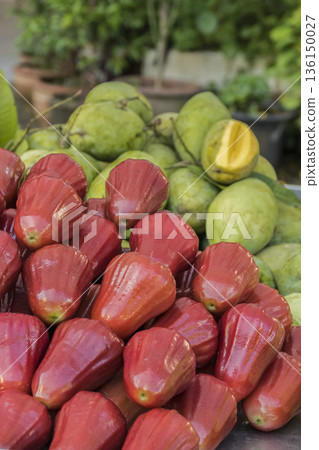 Red rose apple and green mango fruits for sell Red rose apple and green mango fruits for sell 136150027