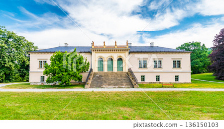 Park and Castle Cechy pod Kosirem, Moravia, Czech Republic. Chateau built in empire style. Outdoors view from public park. 136150103