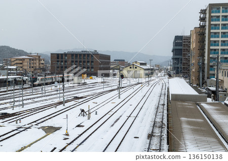 Snow-covered railroad tracks seen from JR Takayama Station Snow-covered railroad tracks seen from JR Takayama Station 136150138