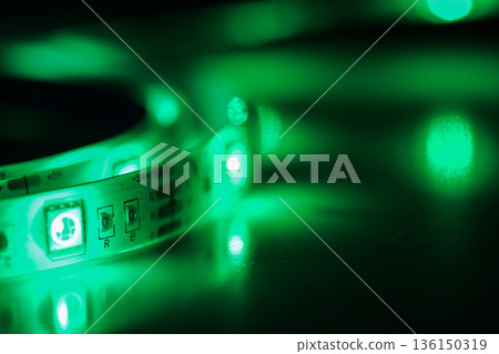 Green led strip light illuminating electronic circuit Green led strip light illuminating electronic circuit 136150319