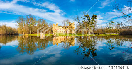 Panoramic view of Janohrad (also known as Januv Hrad) - ancient ruin above river with magic reflection in water. Part of Lednice Valtice UNESCO areal. Czech Republic, Sputh Moravia region. Panoramic view of Janohrad (also known as Januv Hrad) - ancient ruin above river with magic reflection in water. Part of Lednice Valtice UNESCO areal. Czech Republic, Sputh Moravia region. 136150448