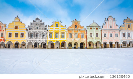 Main square of Telc with its famous 16th-century colorful houses, a UNESCO World Heritage Site since 1992, on a winter day with falling snow. Main square of Telc with its famous 16th-century colorful houses, a UNESCO World Heritage Site since 1992, on a winter day with falling snow. 136150460