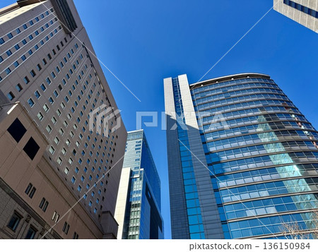 Landscape of the office town looking up at a skyscraper 136150984