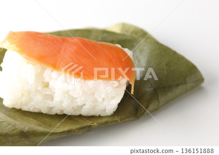 Salmon and oyster sushi photographed on white background 136151888
