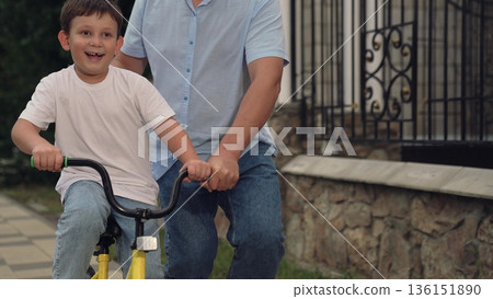 father teaches child ride bike, mother father, adrenaline horse riding, boy laughs smiling sitting bike outdoors, child riding father mother nature, together riding child kid bike, horse riding, walk father teaches child ride bike, mother father, adrenaline horse riding, boy laughs smiling sitting bike outdoors, child riding father mother nature, together riding child kid bike, horse riding, walk 136151890