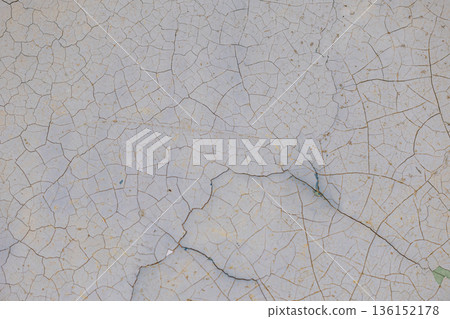 light green concrete wall texture.Texture of cracks on the wall. Old shabby wall. Texture peeling paint. 136152178