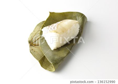 Sea bream persimmon leaf sushi photographed on white background Sea bream persimmon leaf sushi photographed on white background 136152990