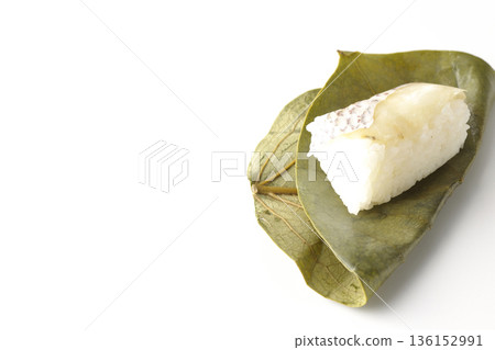 Sea bream persimmon leaf sushi photographed on white background Sea bream persimmon leaf sushi photographed on white background 136152991