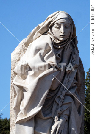 Statue of Saint Catherine of Siena near Sant Angelo Castle in Rome, Italy Statue of Saint Catherine of Siena near Sant Angelo Castle in Rome, Italy 136153034