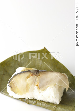 Mackerel persimmon leaf sushi photographed on white background 136153096