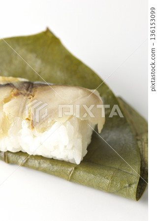 Mackerel persimmon leaf sushi photographed on white background Mackerel persimmon leaf sushi photographed on white background 136153099