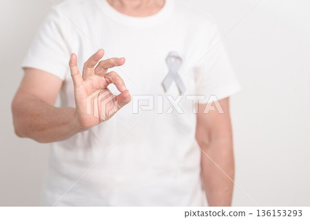 Elderly with Gray ribbon for May Brain Cancer Awareness month and Asthma Awareness, Support life people Survivor. Healthcare and February World cancer day Elderly with Gray ribbon for May Brain Cancer Awareness month and Asthma Awareness, Support life people Survivor. Healthcare and February World cancer day 136153293