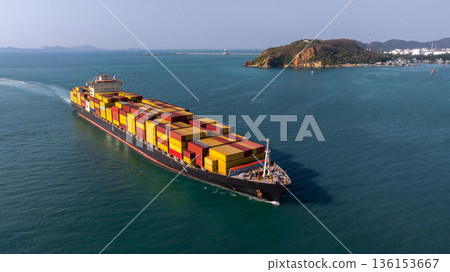 Aerial view container ship carrier container on the sea, Global business logistics and Global trade transportation, Container ship freight shipping import export logistics supply chain. Aerial view container ship carrier container on the sea, Global business logistics and Global trade transportation, Container ship freight shipping import export logistics supply chain. 136153667