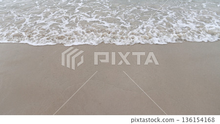 Water from the sea reaching the shoreline Water from the sea reaching the shoreline 136154168