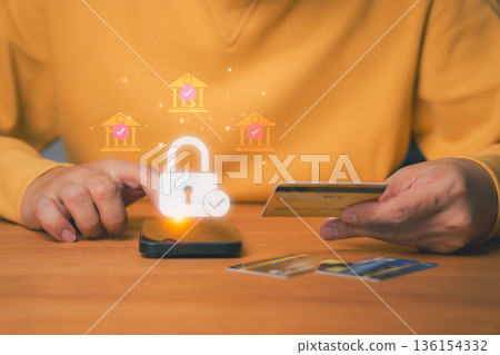 Person uses a smartphone for online banking with a padlock and bank icons, symbolizing secure mobile payments, financial data protection, debt repayment, digital banking security, and encryption. Person uses a smartphone for online banking with a padlock and bank icons, symbolizing secure mobile payments, financial data protection, debt repayment, digital banking security, and encryption. 136154332