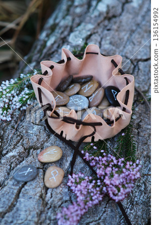 a set of stone runes in a pouch a set of stone runes in a pouch 136154992
