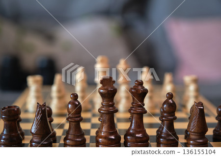 A chess board with pieces ready to play A chess board with pieces ready to play 136155104