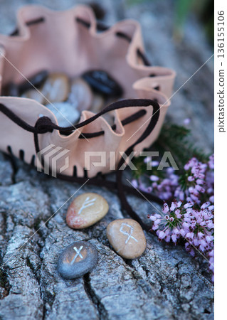 a set of stone runes in a pouch a set of stone runes in a pouch 136155106
