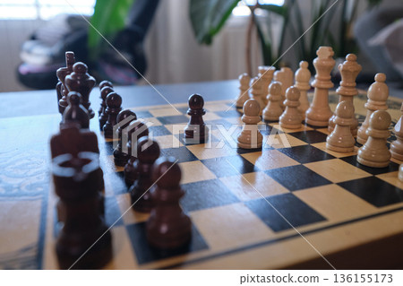 A chess board with pieces ready to play A chess board with pieces ready to play 136155173
