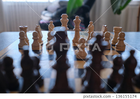 A chess board with pieces ready to play A chess board with pieces ready to play 136155174