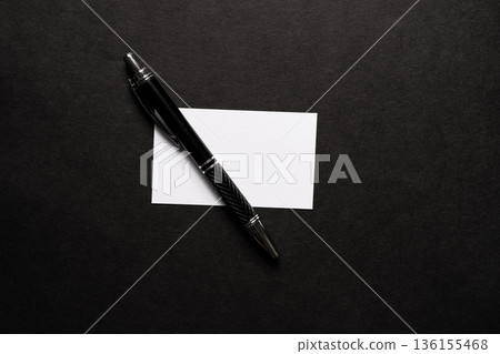 Ballpoint pen and notepad on a blue background Ballpoint pen and notepad on a blue background 136155468