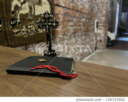 new testament with other church objects on the bench in church new testament with other church objects on the bench in church 136155882