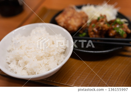Freshly cooked rice served in a bowl Freshly cooked rice served in a bowl 136155997