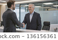 Business handshake of two men in a modern office, concept of successful partnership, deal and teamwork. 136156361