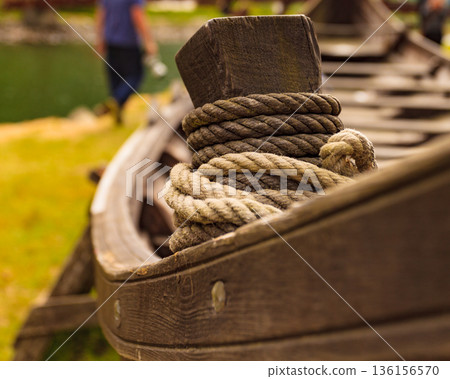 Old viking boat on fjord shore, Norway Old viking boat on fjord shore, Norway 136156570