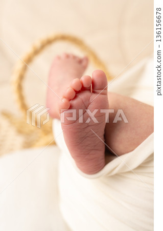 Newborn baby sleeping peacefully, wrapped in soft neutral textiles. Cozy minimal newborn photography expressing love, care, calmness and early family life Newborn baby sleeping peacefully, wrapped in soft neutral textiles. Cozy minimal newborn photography expressing love, care, calmness and early family life 136156678