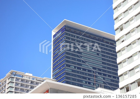 Blue sky and skyscraper cityscape 136157285