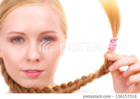 Blonde girl with braid hair 136157318