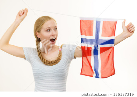 Young woman with norwegian flag 136157319