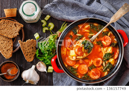 Swamp Soup with Sausage Kale White Bean and Orzo 136157749