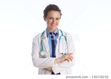 Confident Female Physician in Lab Coat with Arms Crossed Confident Female Physician in Lab Coat with Arms Crossed 136158230