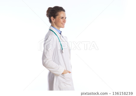 Confident Female Doctor in Profile against White Background 136158239