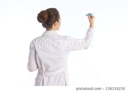 Doctor Interacting with Virtual Medical Screen 136158250