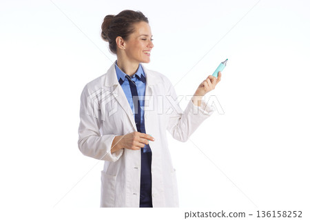 Professional Doctor Explaining Medical Data 136158252