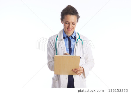 Doctor Writing Medical Prescription on Clipboard 136158253