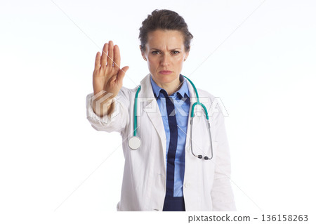 Female Physician Making Serious Stop Gesture Female Physician Making Serious Stop Gesture 136158263