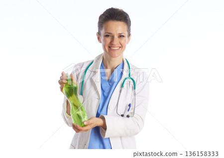 Smiling Doctor Recommending Healthy Hydration 136158333