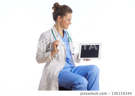 Female Doctor Using Tablet for Telemedicine Female Doctor Using Tablet for Telemedicine 136158344