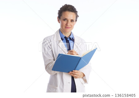 Professional Female Physician with Medical Records Professional Female Physician with Medical Records 136158405