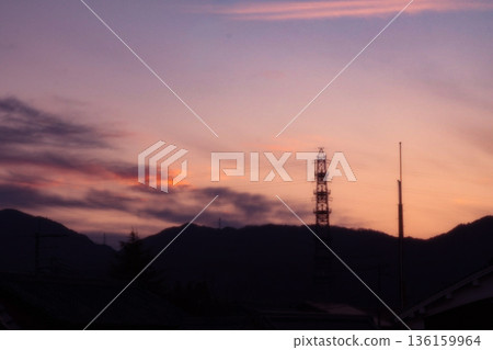 The mountains melting into the twilight and the quiet sky The mountains melting into the twilight and the quiet sky 136159964