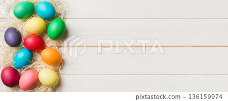 holiday preparation Multi colors Easter eggs on colored background . Pastel color Easter eggs. holiday concept with copy space holiday preparation Multi colors Easter eggs on colored background . Pastel color Easter eggs. holiday concept with copy space 136159974